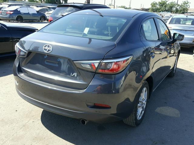 3MYDLBZV9GY115894 - 2016 TOYOTA SCION IA GRAY photo 4