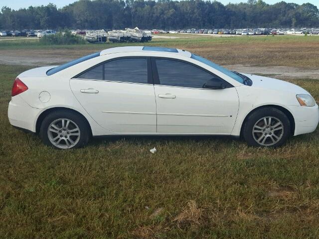 1G2ZG558X64130811 - 2006 PONTIAC G6 WHITE photo 9