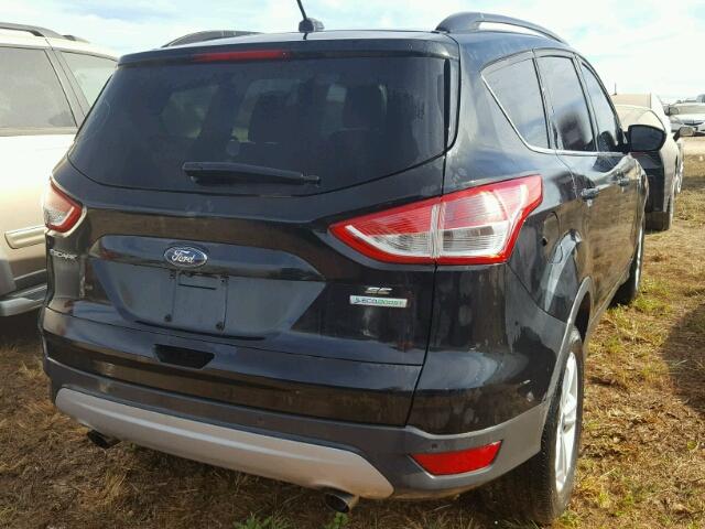 1FMCU0GX8EUA67011 - 2014 FORD ESCAPE BLACK photo 4