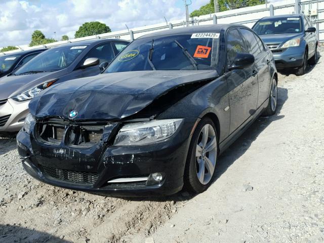 WBAPM77549NL87890 - 2009 BMW 335 I BLACK photo 2