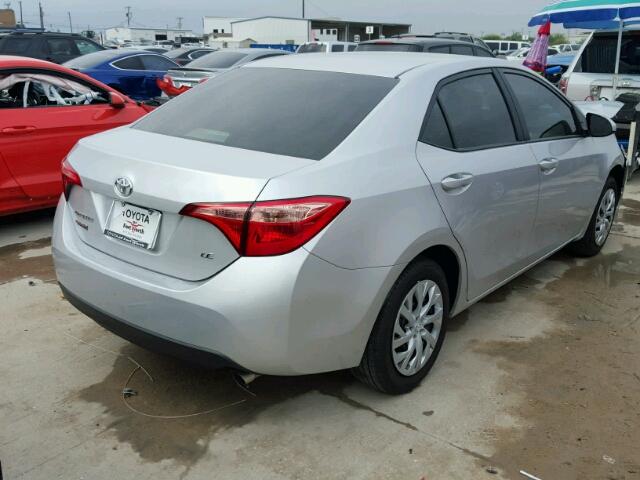 5YFBURHE9HP731061 - 2017 TOYOTA COROLLA SILVER photo 4