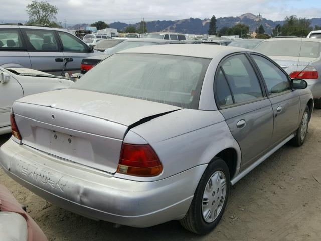 1G8ZH5286XZ370014 - 1999 SATURN SL1 SILVER photo 4