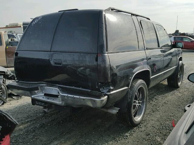 1GNEK13R5XJ500702 - 1999 CHEVROLET TAHOE K150 BLACK photo 4