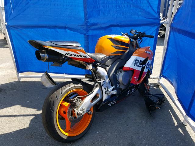 JH2SC57565M100285 - 2005 HONDA CBR1000 RR ORANGE photo 4