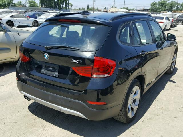 WBAVM1C59DVW46103 - 2013 BMW X1 SDRIVE2 BLACK photo 4