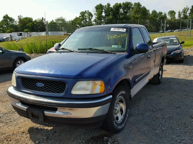 1FTDX1760VKC83881 - 1997 FORD F150 BLUE photo 2