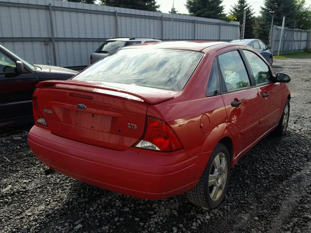 1FAFP38Z34W184434 - 2004 FORD FOCUS ZTS RED photo 4
