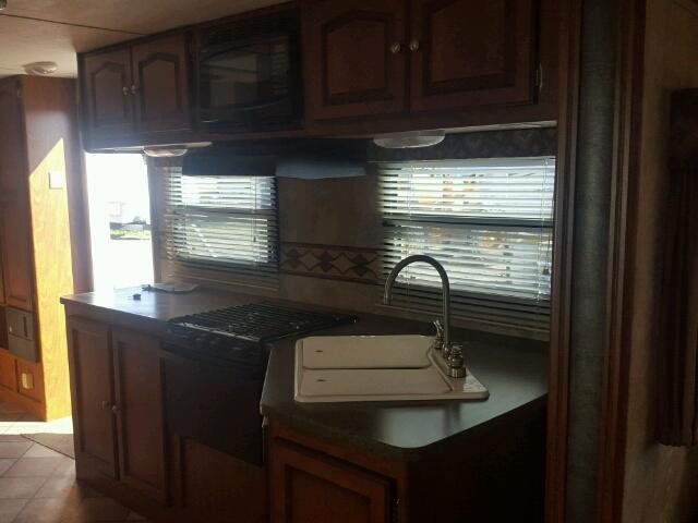 4YDT31828CT413428 - 2012 KEYSTONE PASSPORT WHITE photo 7