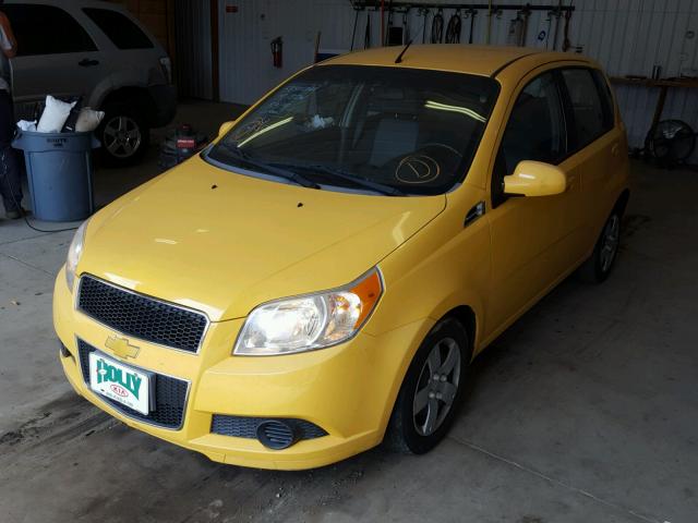 KL1TD6DE0BB138243 - 2011 CHEVROLET AVEO LS YELLOW photo 2
