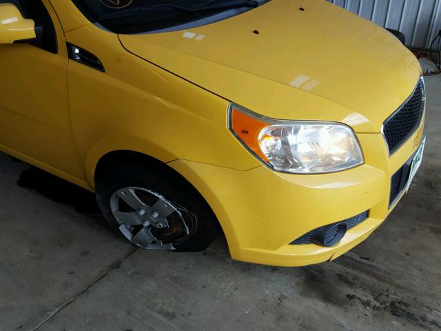 KL1TD6DE0BB138243 - 2011 CHEVROLET AVEO LS YELLOW photo 9