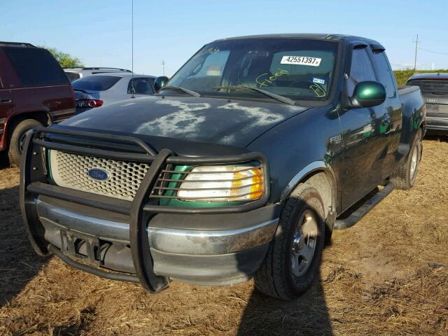 1FTZX0722YKB38665 - 2000 FORD F150 GREEN photo 2