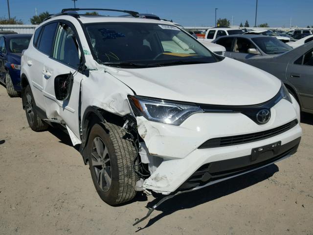 JTMRFREV2HJ126171 - 2017 TOYOTA RAV4 XLE WHITE photo 1