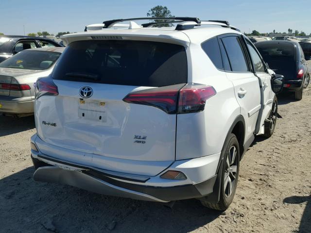 JTMRFREV2HJ126171 - 2017 TOYOTA RAV4 XLE WHITE photo 4