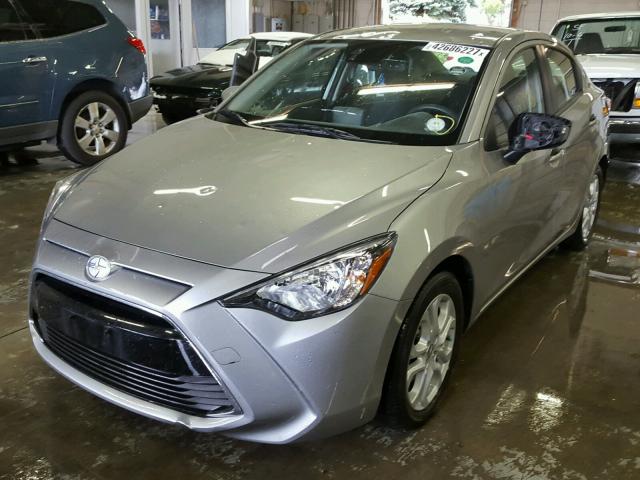 3MYDLBZV0GY135399 - 2016 TOYOTA SCION IA SILVER photo 2