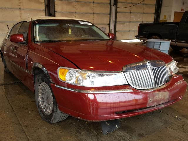 1LNHM83W4XY618712 - 1999 LINCOLN TOWN CAR C BURGUNDY photo 1