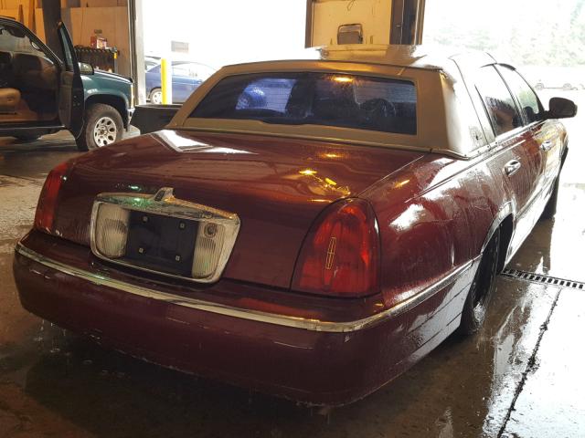 1LNHM83W4XY618712 - 1999 LINCOLN TOWN CAR C BURGUNDY photo 4