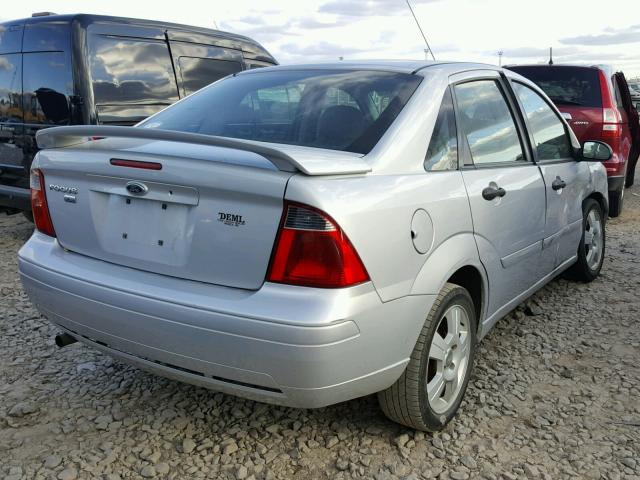 1FAHP34N87W188804 - 2007 FORD FOCUS GRAY photo 4