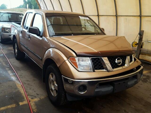 1N6AD07U95C429335 - 2005 NISSAN FRONTIER C GOLD photo 1