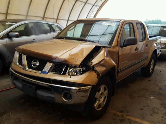 1N6AD07U95C429335 - 2005 NISSAN FRONTIER C GOLD photo 2