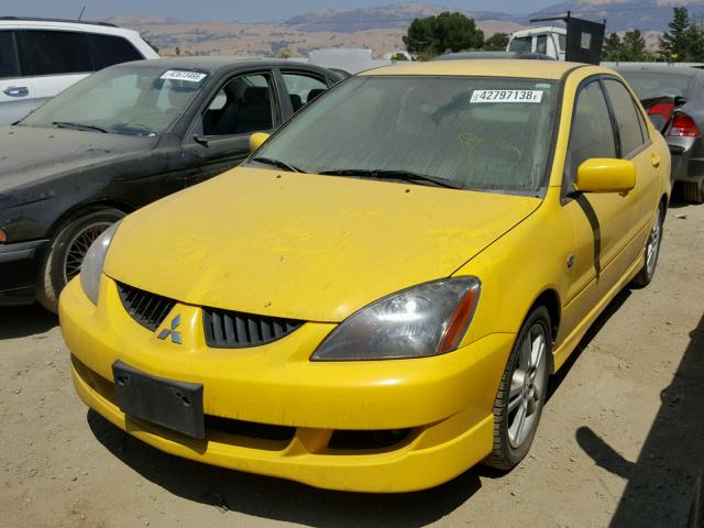 JA3AJ66F34U016531 - 2004 MITSUBISHI LANCER RAL YELLOW photo 2