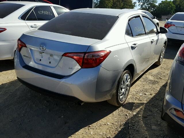 5YFBURHE8HP707785 - 2017 TOYOTA COROLLA L SILVER photo 4