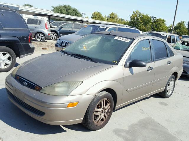 1FAFP34Z74W200124 - 2004 FORD FOCUS SE C TAN photo 2