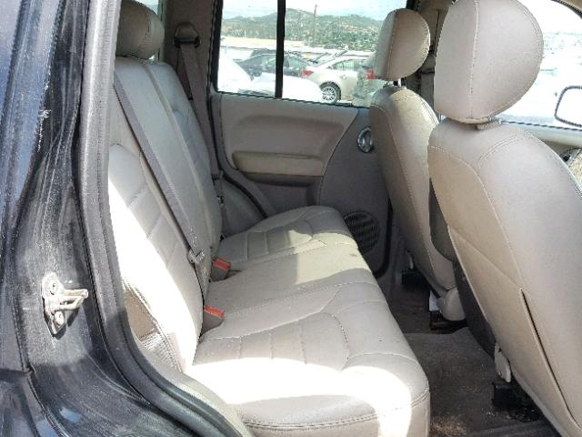 1J8GL38K14W131205 - 2004 JEEP LIBERTY RE BLACK photo 6