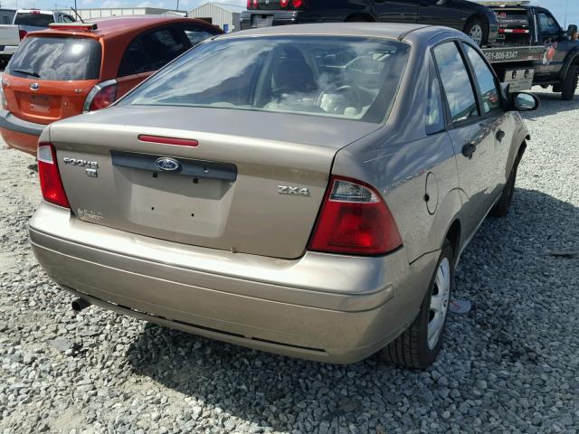 1FAFP34N35W134850 - 2005 FORD FOCUS ZX4 GOLD photo 4