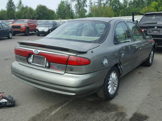 1FAFP6531XK159500 - 1999 FORD CONTOUR LX GRAY photo 4