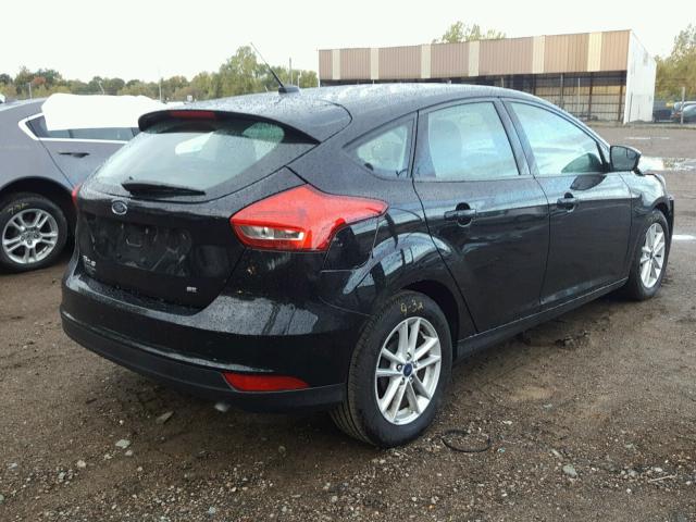 1FADP3K21HL210944 - 2017 FORD FOCUS BLACK photo 4