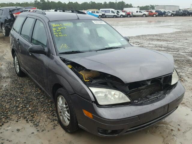 1FAHP36N37W207918 - 2007 FORD FOCUS GRAY photo 1