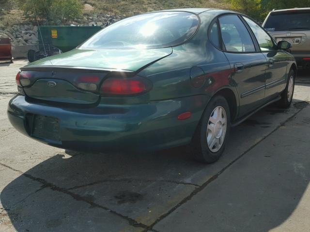 1FAFP53U9XG209164 - 1999 FORD TAURUS SE GREEN photo 4