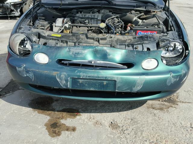 1FAFP53U9XG209164 - 1999 FORD TAURUS SE GREEN photo 7