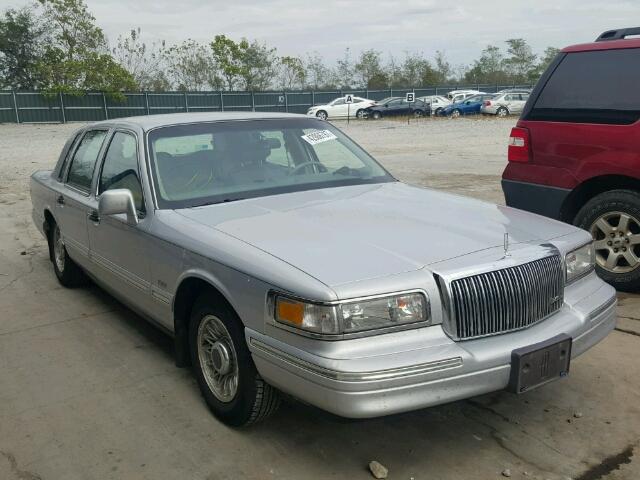 1LNLM82W7SY763229 - 1995 LINCOLN TOWN CAR SILVER photo 1