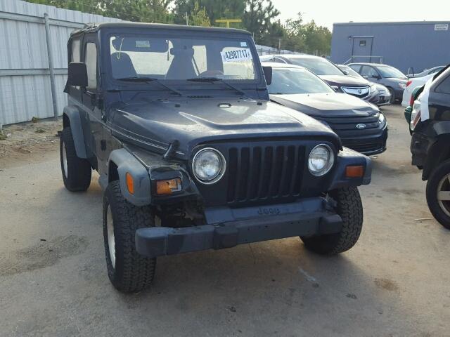 1J4FY29P0XP473472 - 1999 JEEP WRANGLER / BLACK photo 1