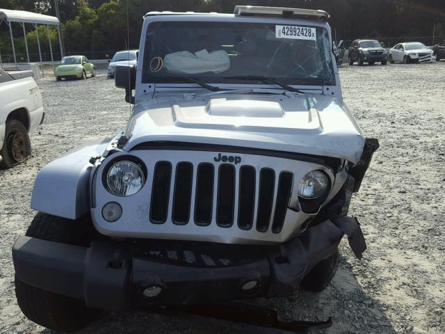 1C4AJWBG6EL239752 - 2014 JEEP WRANGLER S SILVER photo 9