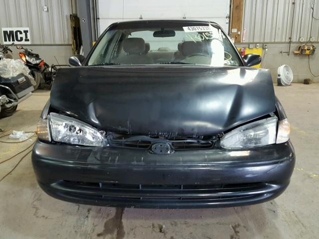 1Y1SK52892Z421597 - 2002 CHEVROLET GEO PRIZM BLACK photo 7