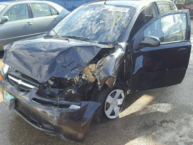 KL1TD66646B665696 - 2006 CHEVROLET AVEO BASE Czarny zdjęcie 9