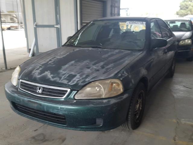 JHMEJ662XYS010113 - 2000 HONDA CIVIC DX GREEN photo 2