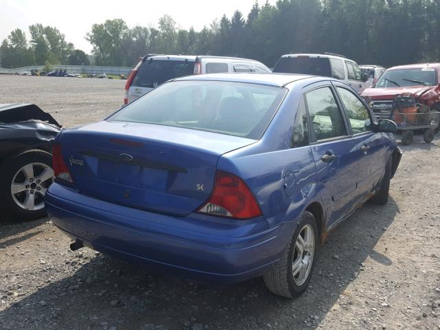 1FAFP34Z24W136459 - 2004 FORD FOCUS SE C BLUE photo 4