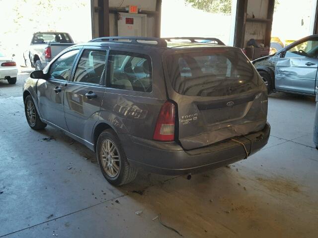 1FAFP36N85W184138 - 2005 FORD FOCUS GRAY photo 3