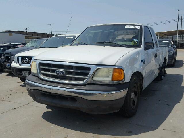 2FTRX17WX4CA35873 - 2004 FORD F-150 HERI WHITE photo 2