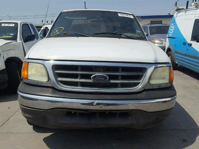 2FTRX17WX4CA35873 - 2004 FORD F-150 HERI WHITE photo 9