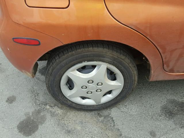 KL1TD66677B756334 - 2007 CHEVROLET AVEO BASE Pomarańczowy zdjęcie 9