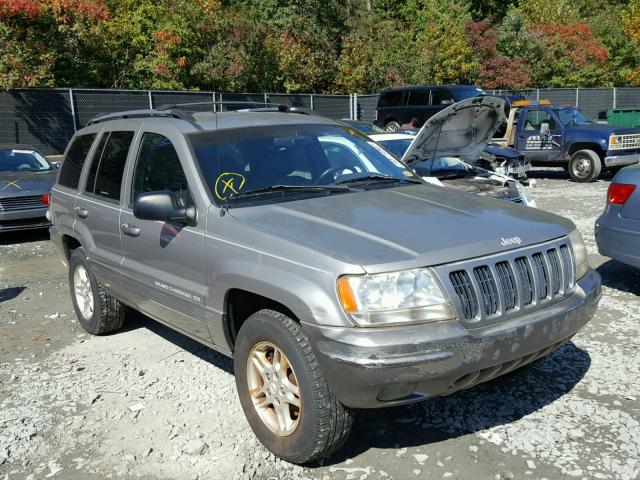 1J4G268S1XC690555 - 1999 JEEP GRAND CHER SILVER photo 1