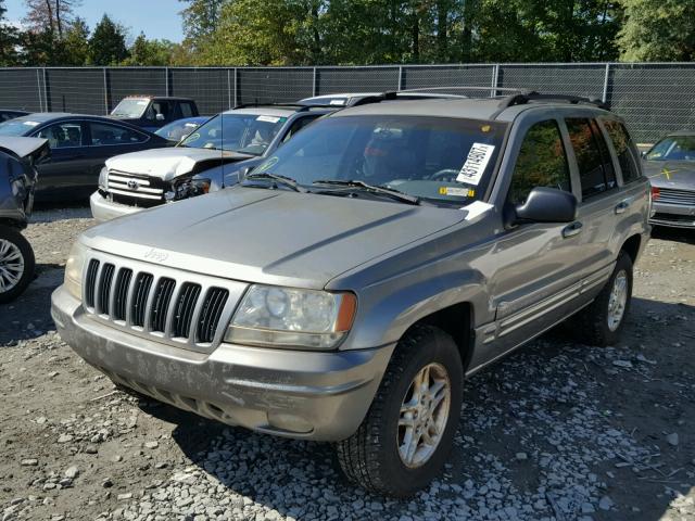 1J4G268S1XC690555 - 1999 JEEP GRAND CHER SILVER photo 2