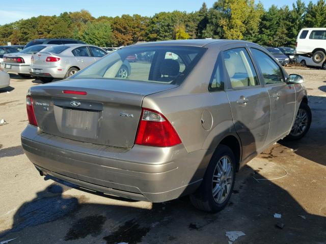 1FAFP34N95W168131 - 2005 FORD FOCUS TAN photo 4