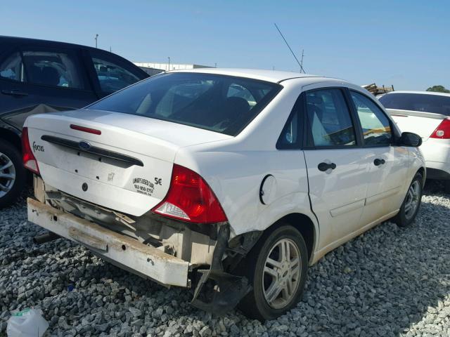 1FAFP34P0YW224835 - 2000 FORD FOCUS WHITE photo 4