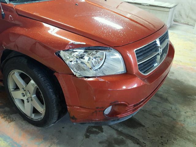 1B3HE78KX7D288956 - 2007 DODGE CALIBER R/ ORANGE photo 9