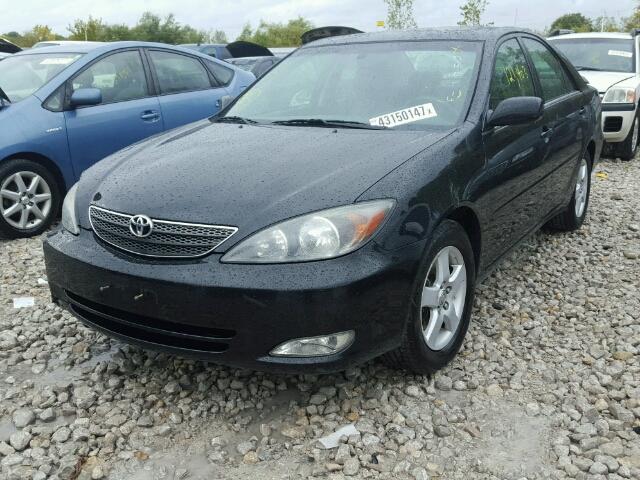 JTDBF30K120046014 - 2002 TOYOTA CAMRY LE BLACK photo 2